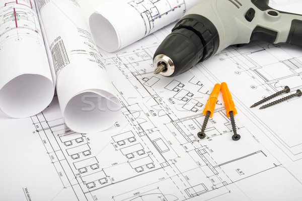 Architecture plan and rolls of blueprints Stock photo © cherezoff