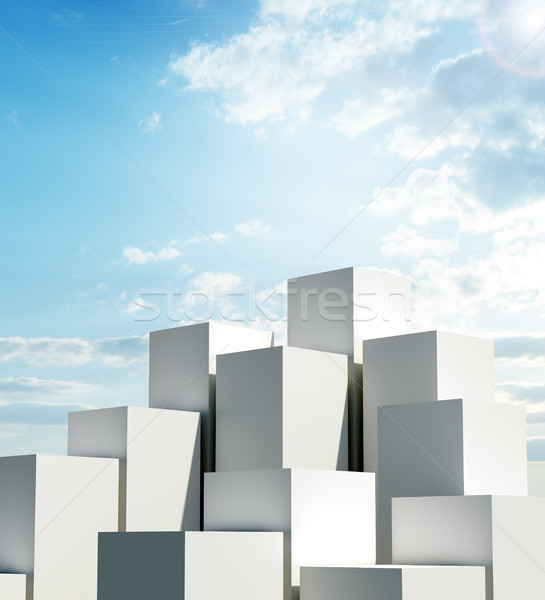 A group of tall cubes against a blue sky Stock photo © cherezoff
