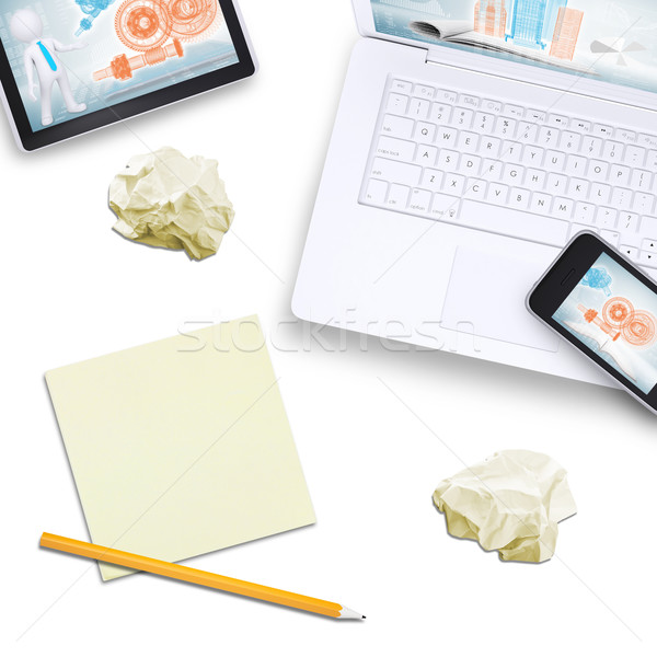 Stock photo: Phone on laptop with tablet, note paper near
