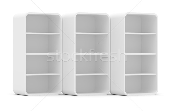 Three empty rotated retail shelves. Front view Stock photo © cherezoff