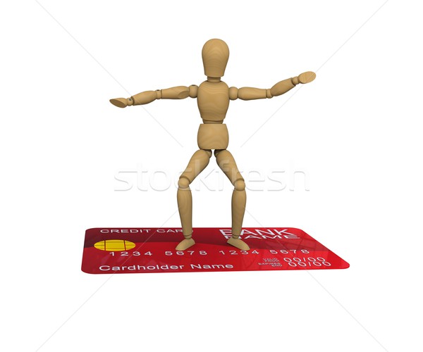 The wooden man stands on the credit card surfer pose. 3D rendering Stock photo © cherezoff