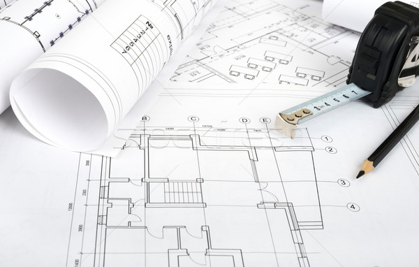 Architecture plan and rolls of blueprints Stock photo © cherezoff