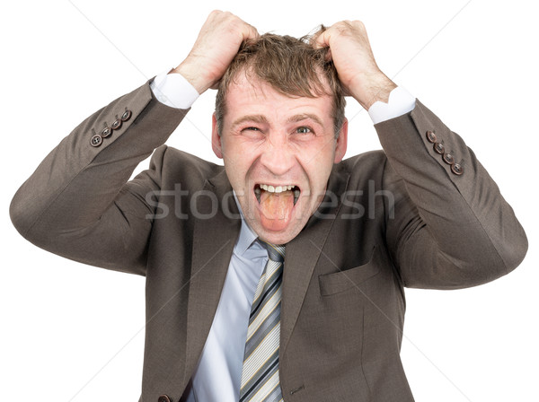 Screaming businessman tearing his hair Stock photo © cherezoff