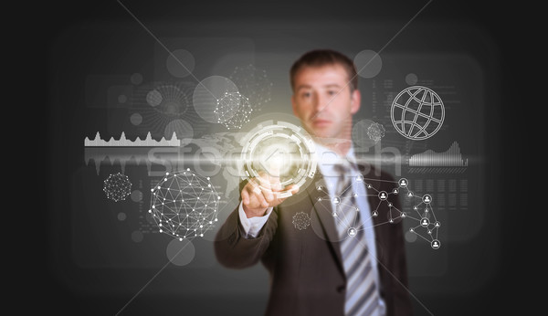 üzletember öltöny ujj virtuális gomb grafikonok Stock fotó © cherezoff