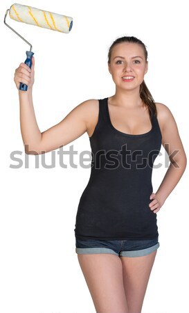 Woman using paint roller Stock photo © cherezoff