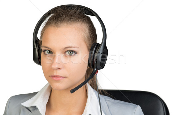Businesswoman in headset Stock photo © cherezoff