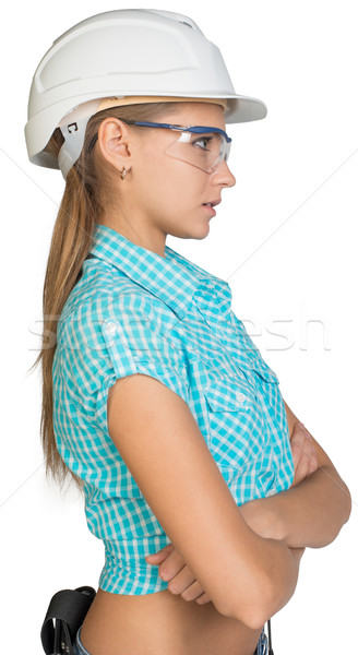 Woman in hard hat and protective glasses Stock photo © cherezoff