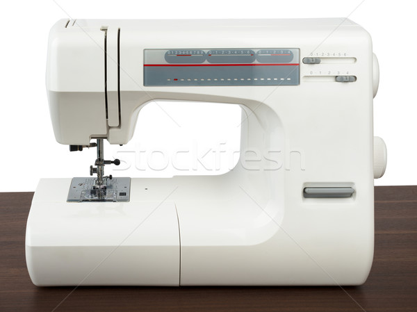 Stock photo: Sewing machine isolated on white background