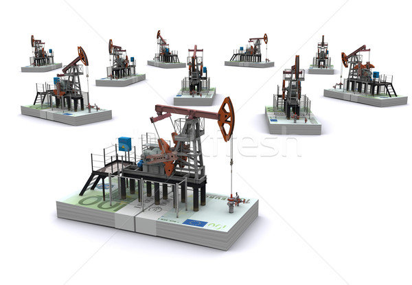 Oil pump-jacks stands on a packs of euro Stock photo © cherezoff
