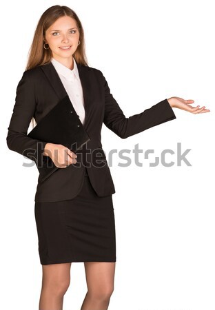 Beautiful business woman showing blank area for sign or copyspase Stock photo © cherezoff