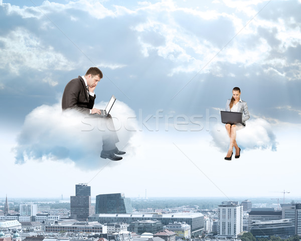 Business people working on clouds Stock photo © cherezoff
