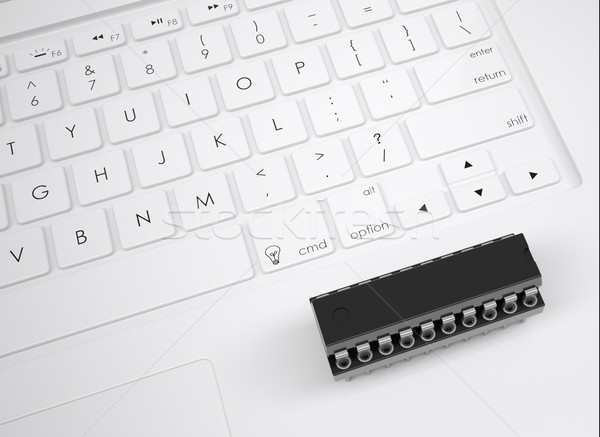 Electronic chip on the keyboard Stock photo © cherezoff