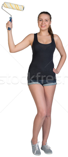 Woman holding paint roller Stock photo © cherezoff