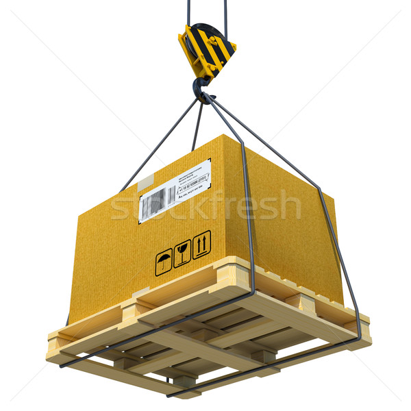 Pallet with cardboard lifted by crane Stock photo © cherezoff