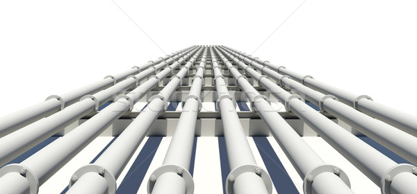 Many white industrial pipes stretching into distance. Isolated. Transportation concept Stock photo © cherezoff