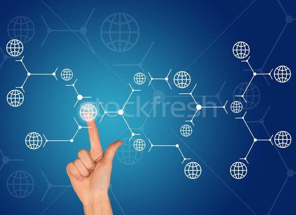 Forefinger presses on white globe. Connection concept Stock photo © cherezoff