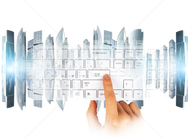 Womans hand with keyboard Stock photo © cherezoff