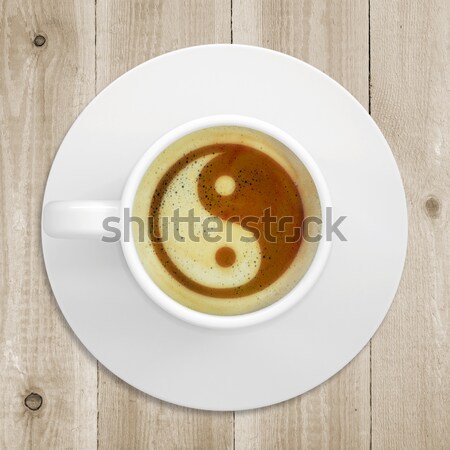 Picture of the yin-yang in the coffee foam Stock photo © cherezoff