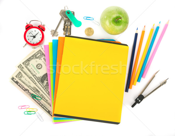 Copybooks with cash and office stuff Stock photo © cherezoff