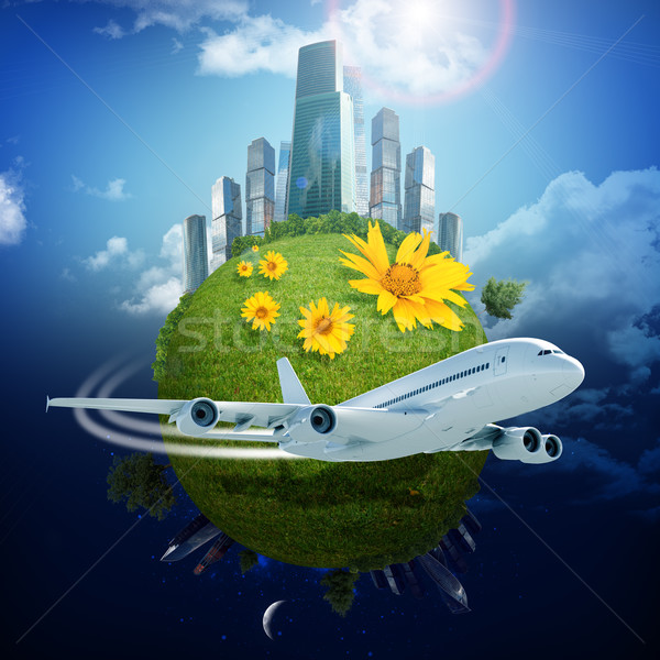 Aarde stad jet blauwe hemel bloemen boom Stockfoto © cherezoff