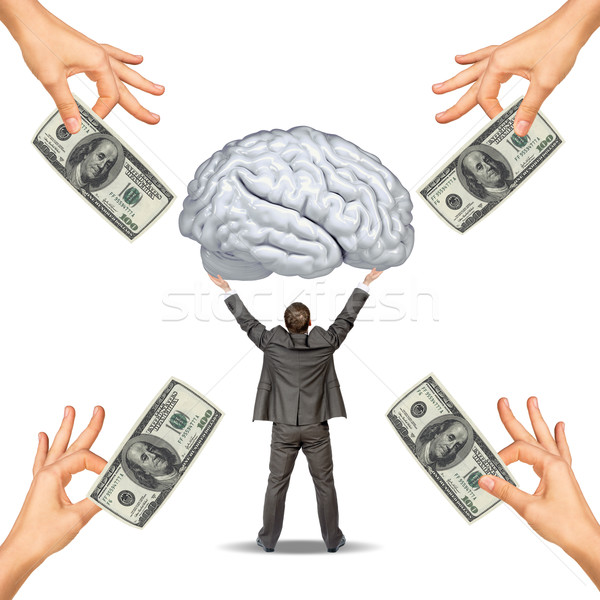 Businessman holding big brain Stock photo © cherezoff