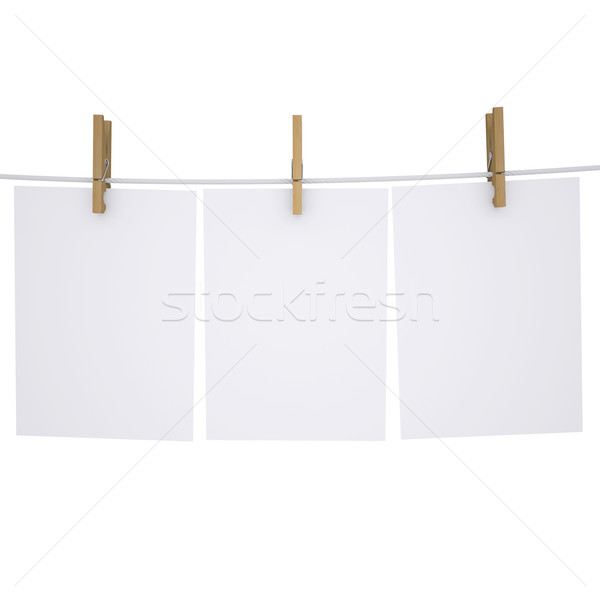 Paper on a rope with clothespins Stock photo © cherezoff