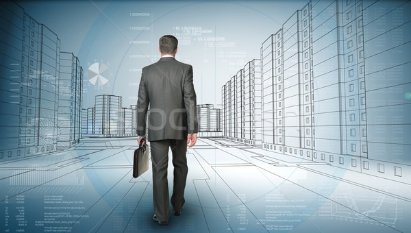 Back view of business man holding briefcase and walking forward on road Stock photo © cherezoff