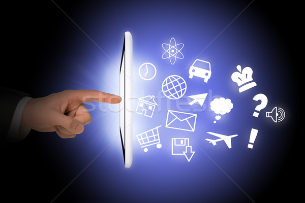 Tablet with icons and humans hand Stock photo © cherezoff