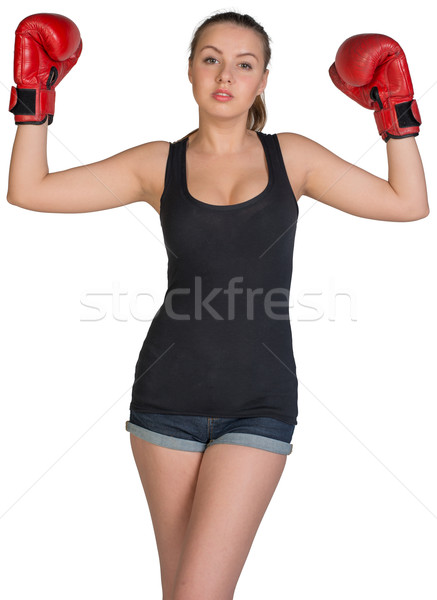 Woman in boxing gloves posing with her arms up Stock photo © cherezoff