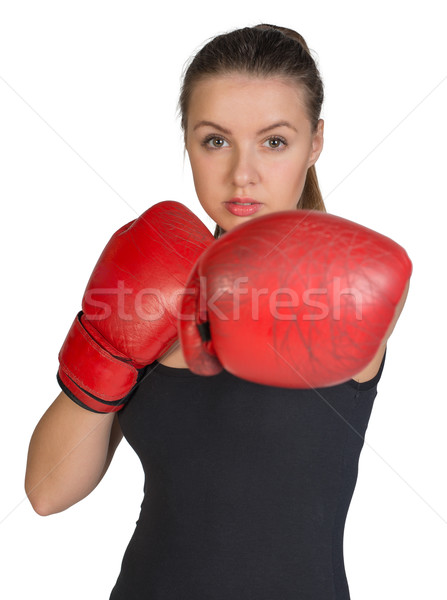 Woman in boxing gloves. Punching pose Stock photo © cherezoff