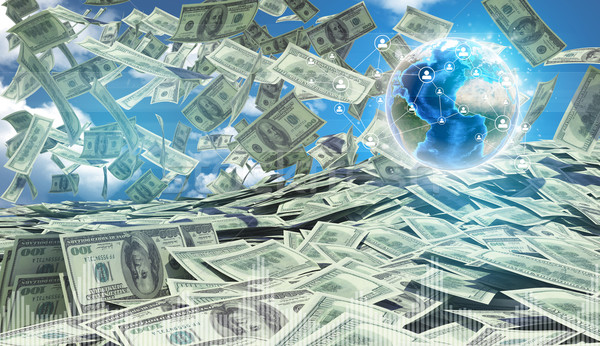 American money falling. Against background of globe earth and blue sky with clouds Stock photo © cherezoff