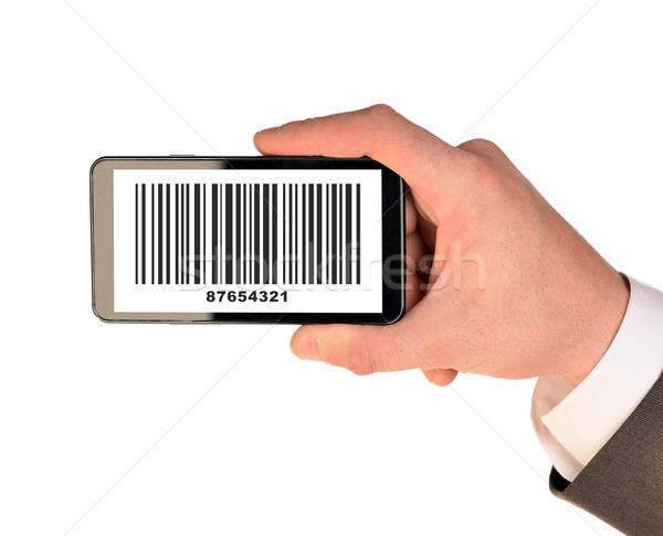 Businessmans hand holding smartphone Stock photo © cherezoff