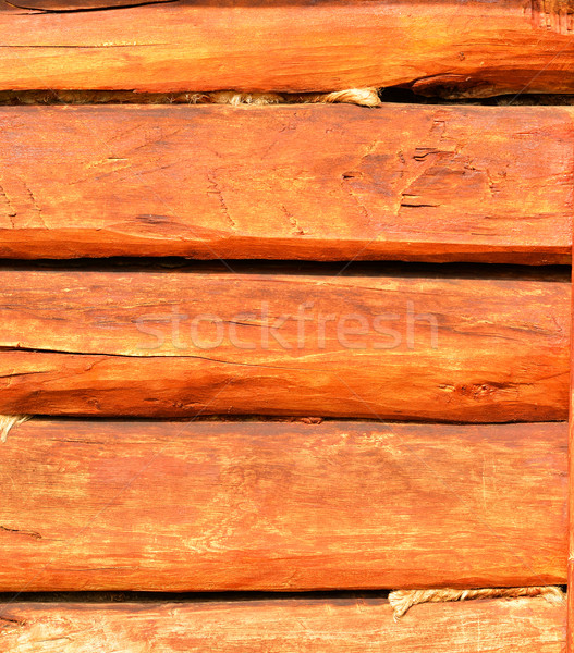 Wall made ​​of wooden beams Stock photo © cherezoff