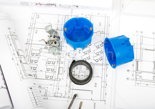 Architecture plan and rolls of blueprints Stock photo © cherezoff