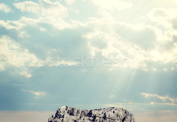 Zonlicht wolken steen zon Stockfoto © cherezoff