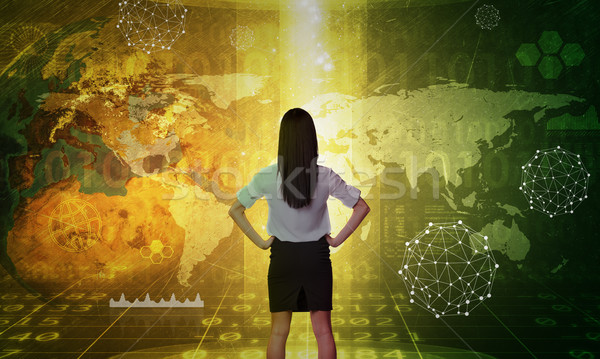 деловой женщины голографический экране земле мира номера Сток-фото © cherezoff