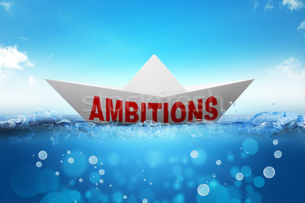 Stock photo: Origami paper boat with word ambitions