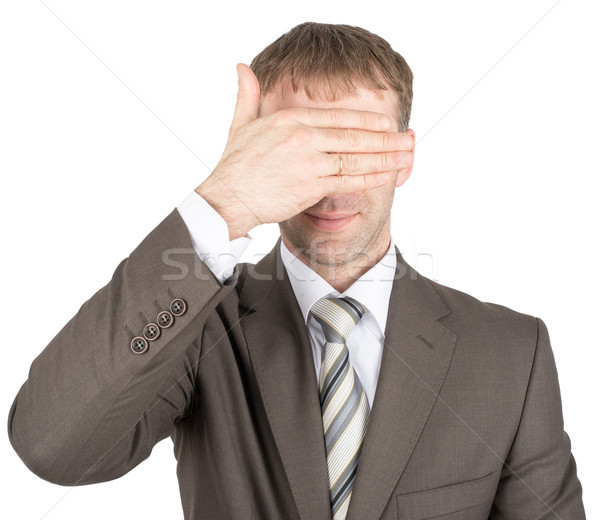 Man closes eyes with his hand Stock photo © cherezoff