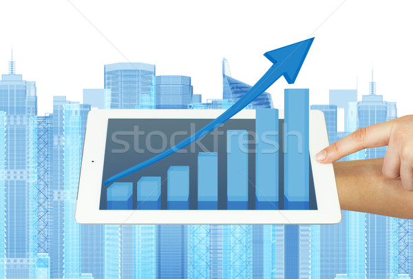 Stock photo: Hands holding a tablet pc