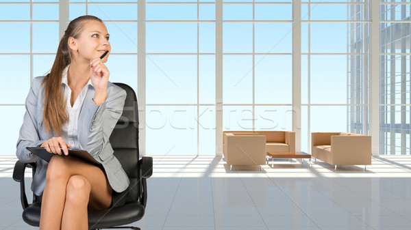 Businesswoman in headset, interior with transparent wall Stock photo © cherezoff
