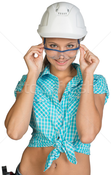 Woman in hard hat and protective glasses Stock photo © cherezoff