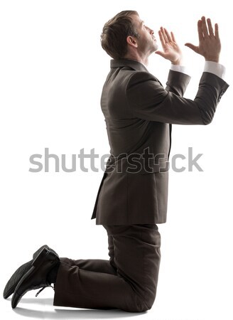 Isolated business man pray position Stock photo © cherezoff