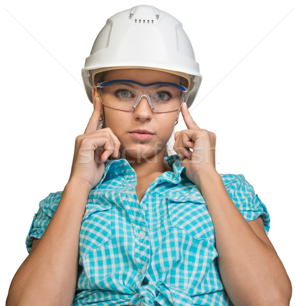 Woman in hard hat and protective glasses Stock photo © cherezoff