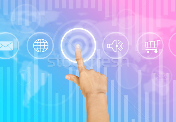 Humans hand clicking on virtual colorful screen Stock photo © cherezoff