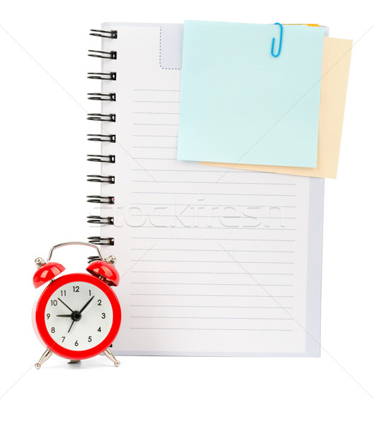 Copybook with stickers and alarm clock Stock photo © cherezoff