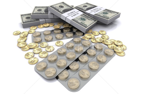 pack of tablets with the coins in dollars Stock photo © cherezoff