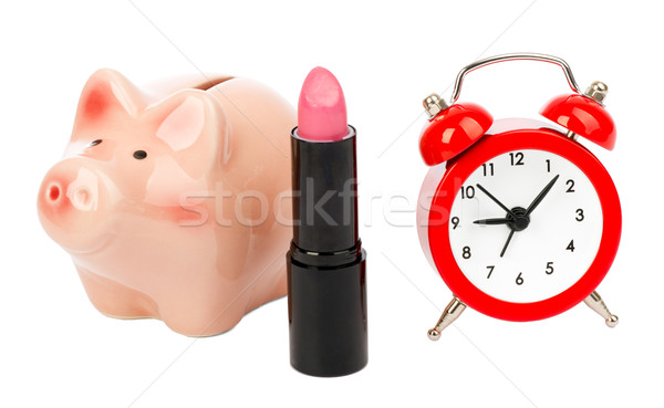 Stock photo: Lipstick with piggy bank