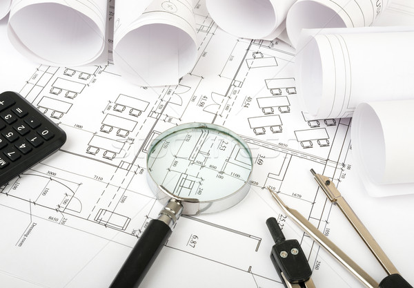 Architecture plan and rolls of blueprints Stock photo © cherezoff