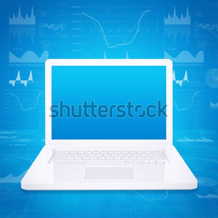 Laptop on high-tech blue background Stock photo © cherezoff