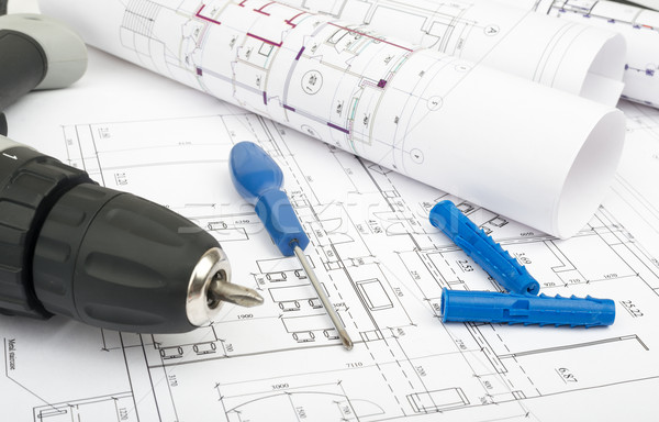 Architecture plan and rolls of blueprints Stock photo © cherezoff